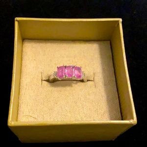 Pink sapphire and diamond ring